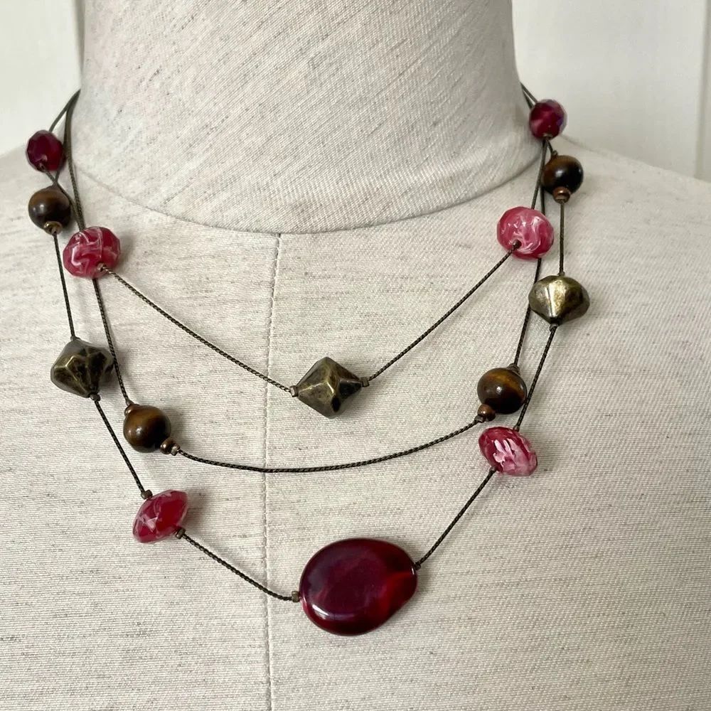 Multi strand floating bead necklace